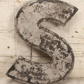 Lot 129 - Vintage Metal Letter S Sign With Heavy Surface Wear And Black Paint Remnants, Worn Maker And Patent Mark On Verso