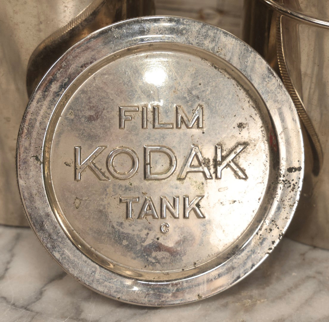 Lot 131 - Pair Of Vintage Kodak Stainless Steel Film Developing Tanks With Reels And Aprons