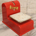 Lot 132 - Vintage Wa-It Red Plastic And White Painted Tin Toy Scale With Scroll Decal, Manufactured By The Al-Vern Corp, Jerome, Michigan