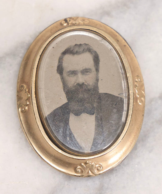 Lot 016 - Antique Tintype Portrait Brooch In Oval Metal Mount With Photo Of Bearded Gentleman