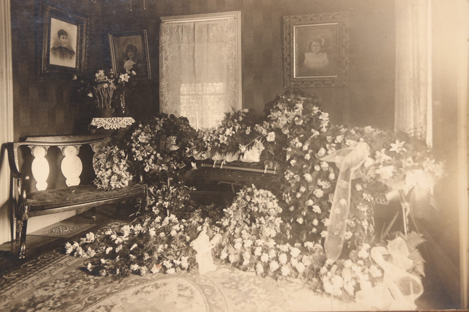 Lot 018 - Antique Board-Mounted Photograph Depicting Funeral Of Charles D. Brown, Died March 29, 1921, Home Parlor Setting With Casket And Floral Arrangements