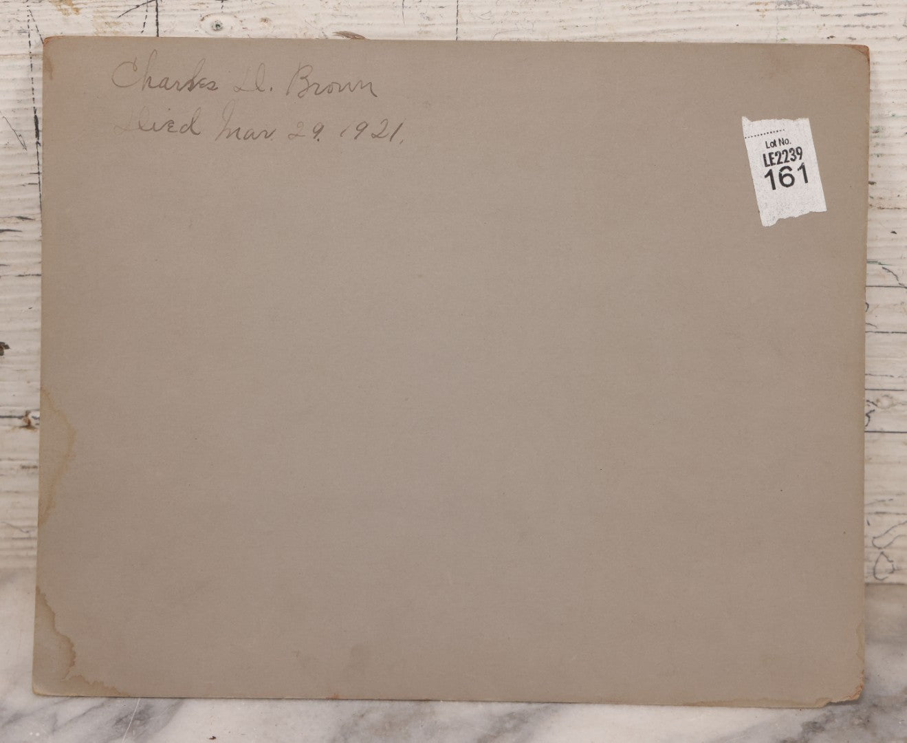 Lot 018 - Antique Board-Mounted Photograph Depicting Funeral Of Charles D. Brown, Died March 29, 1921, Home Parlor Setting With Casket And Floral Arrangements