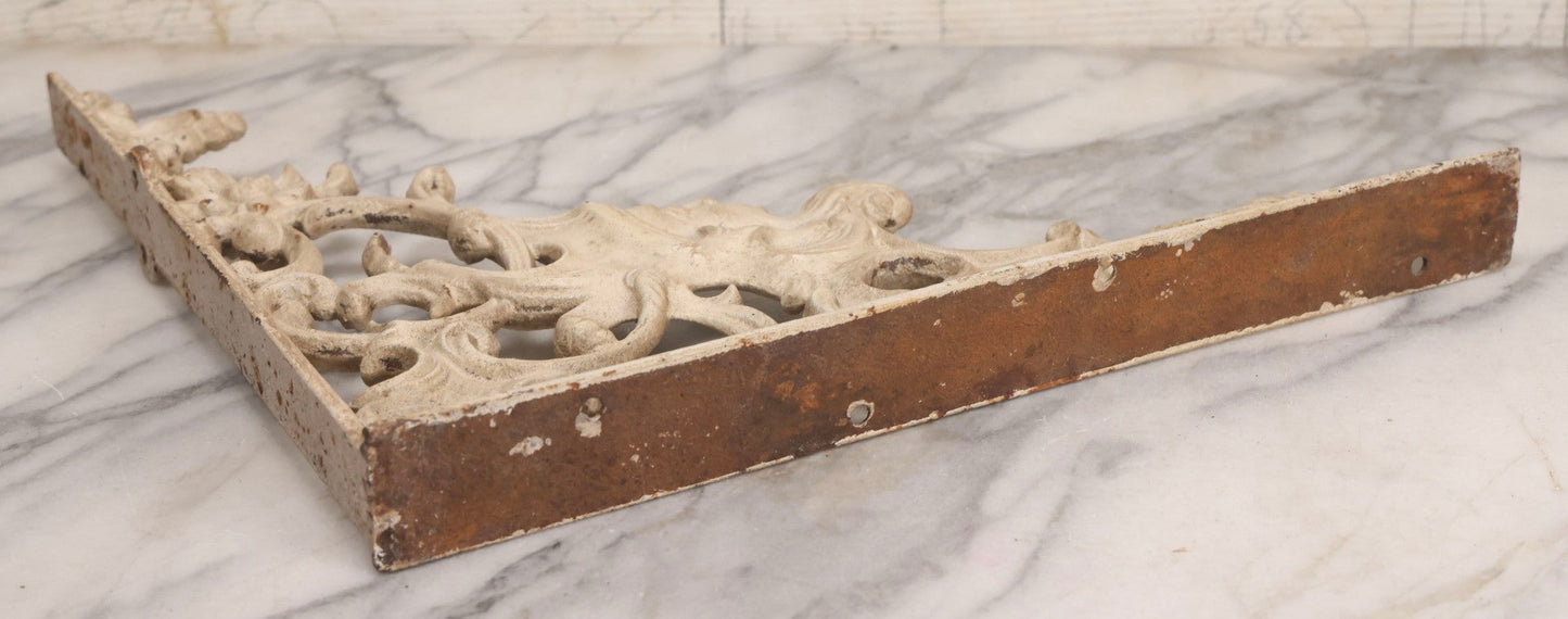 Lot 028 - Pair Of Antique White Painted Cast Iron Ornate Architectural Shelf Brackets With Figural Face Motif