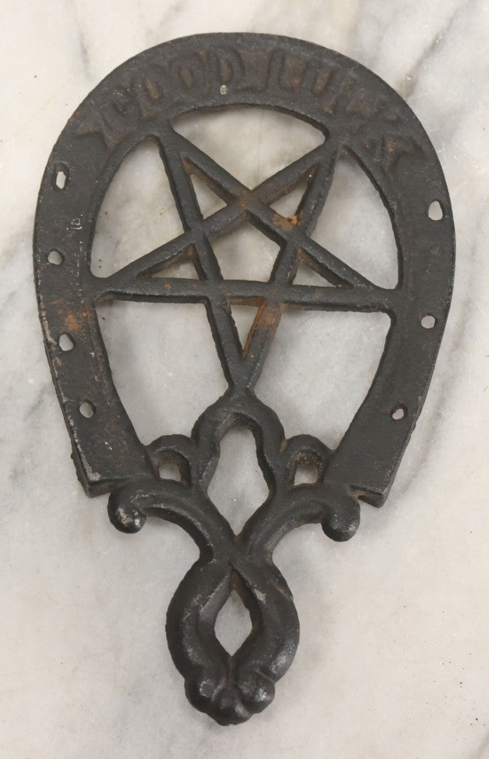 Lot 030 - Vintage Cast Iron Trivet With Pentagram Design And "Good Luck" Inscription