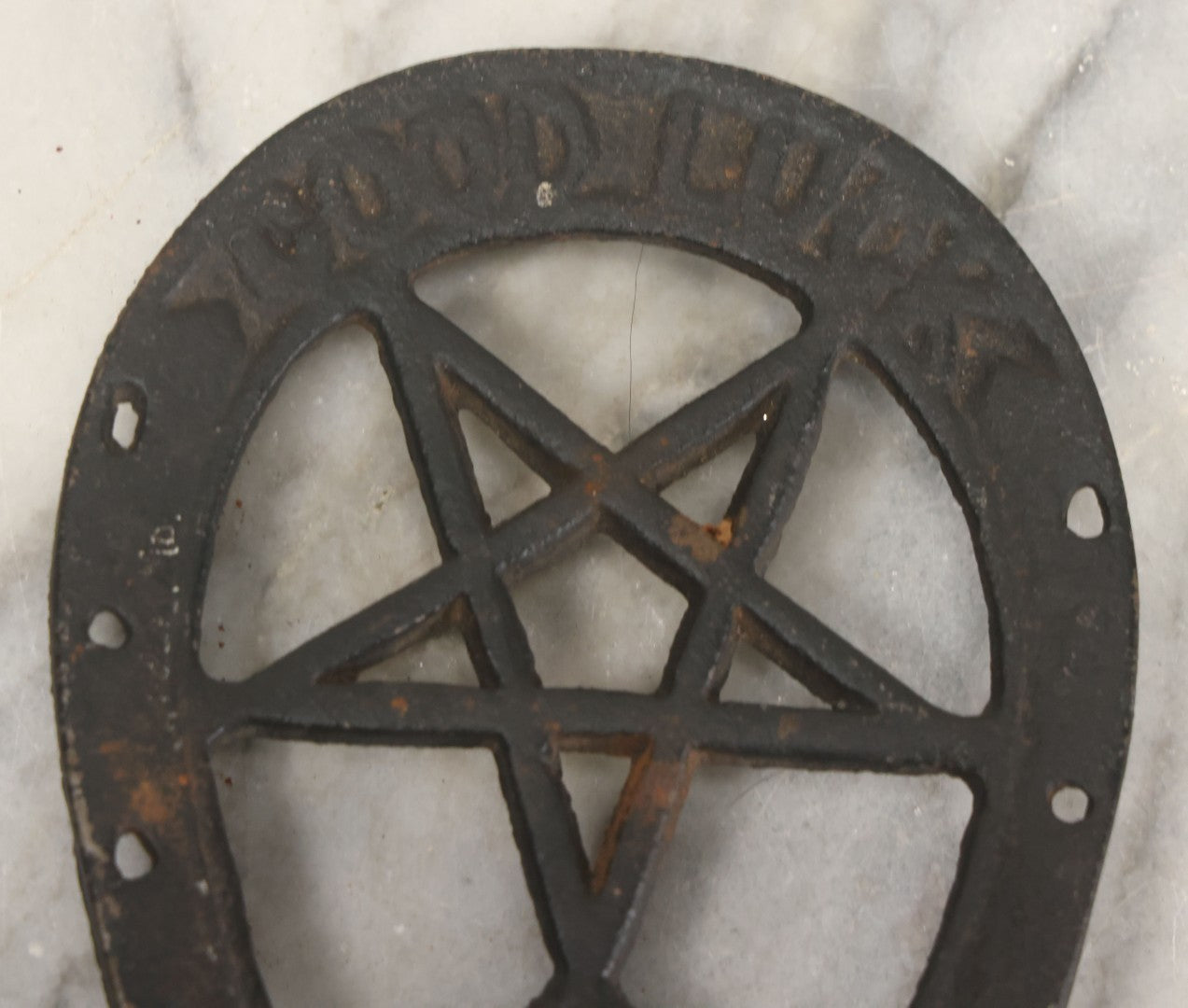 Lot 030 - Vintage Cast Iron Trivet With Pentagram Design And "Good Luck" Inscription