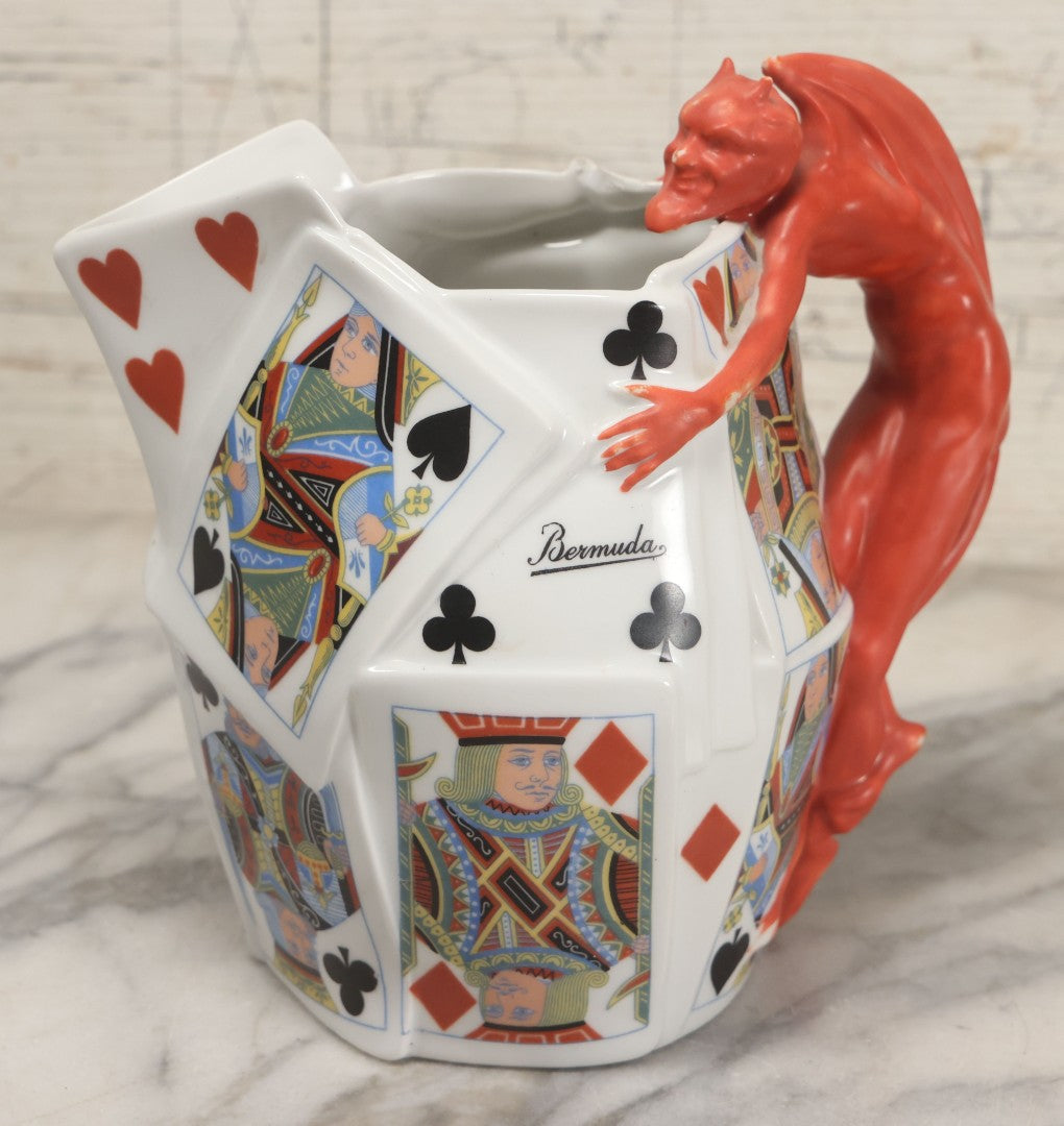 Lot 032 - Vintage Royal Bayreuth "Devil & Cards" Pitcher With Playing Card Motif And Devil Handle, Circa 1940s Marked "Bermuda", Note Chip To Spout