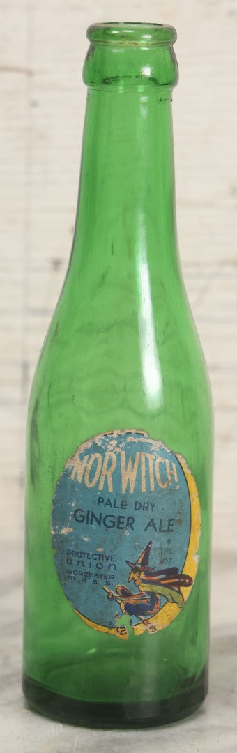 Lot 045 - Vintage Norwitch Pale Dry Ginger Ale Green Glass Soda Bottle With Witch Label, Protective Union, Worcester, Massachusetts, Early 20th Century