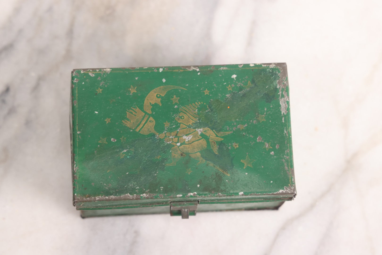 Lot 046 - Antique Green Tin Lithograph And Gold Stencil Painted Toleware Box With Witch, Moon And Celestial Motif, Circa 1920s