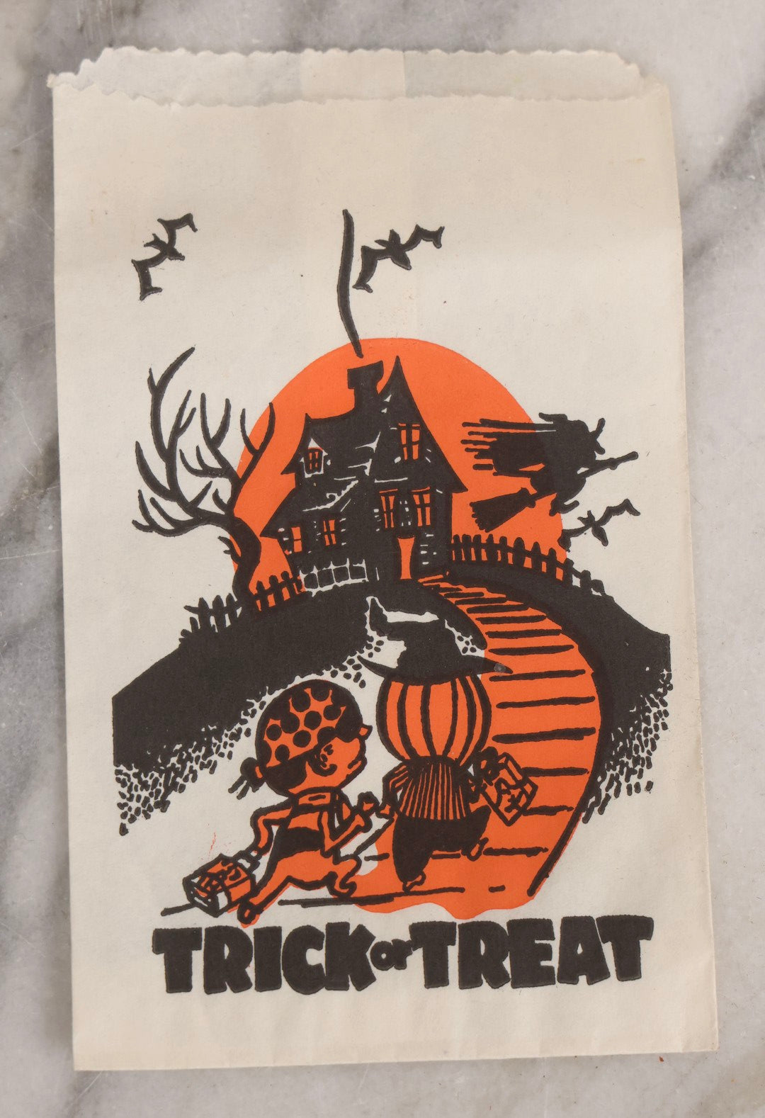 Lot 050 - Trio Of Vintage Halloween Items Including Gurley Jack O' Lantern Candle In Box, Trick-Or-Treat Bag, And Chazy Orchards Ghost Apple Bag