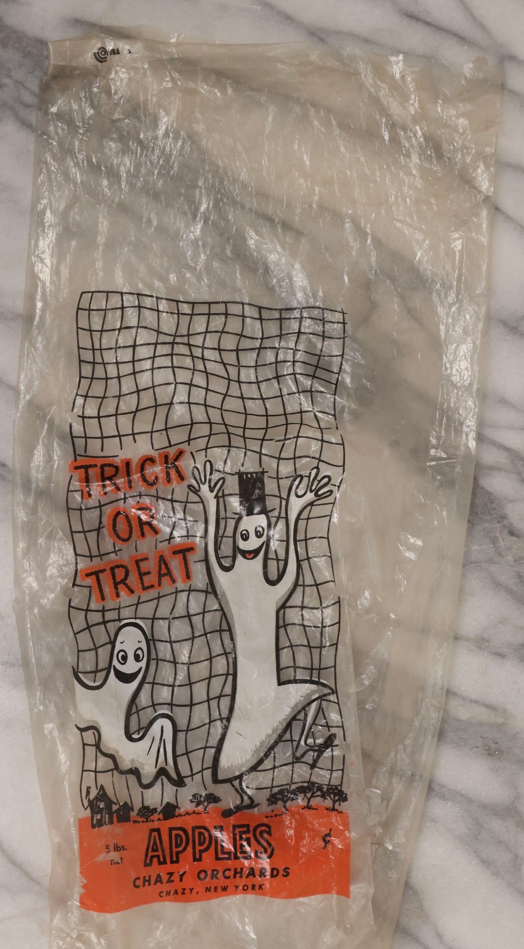 Lot 050 - Trio Of Vintage Halloween Items Including Gurley Jack O' Lantern Candle In Box, Trick-Or-Treat Bag, And Chazy Orchards Ghost Apple Bag