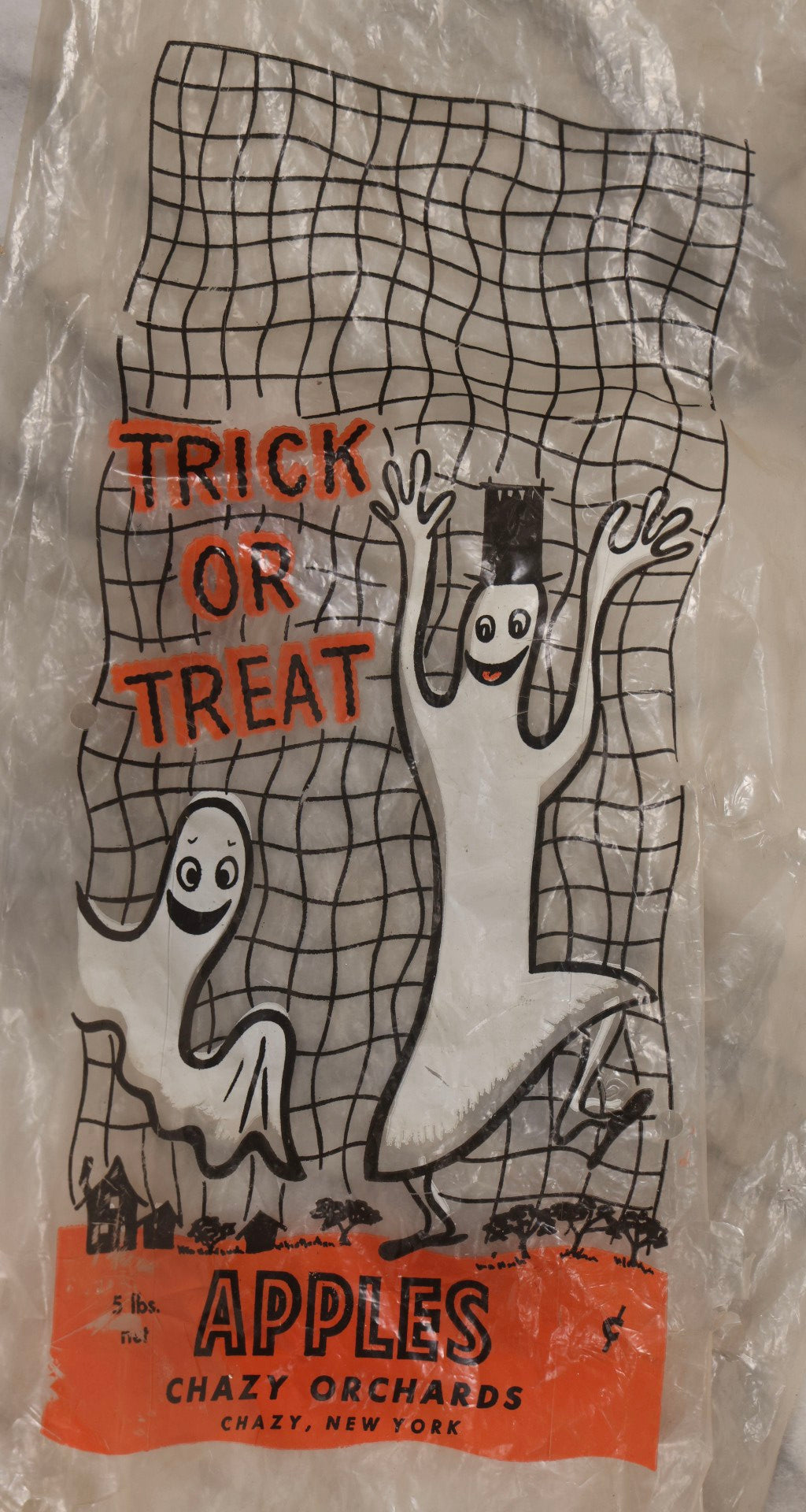 Lot 050 - Trio Of Vintage Halloween Items Including Gurley Jack O' Lantern Candle In Box, Trick-Or-Treat Bag, And Chazy Orchards Ghost Apple Bag