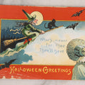 Lot 051 - Antique Embossed Halloween Postcard Featuring Witch On Broomstick With Black Cat, Moon, And Woman In Bonnet, Orange Border, Illustrated By E.C. Banks, Made In Saxony, Postmarked 1909