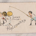 Lot 055 - Antique Halloween Postcard, "Lucky Halloween", Boy With Jack-O-Lantern J.O.L. On Fishing Pole And Girl With Mirror, Halloween Series No. 8-A