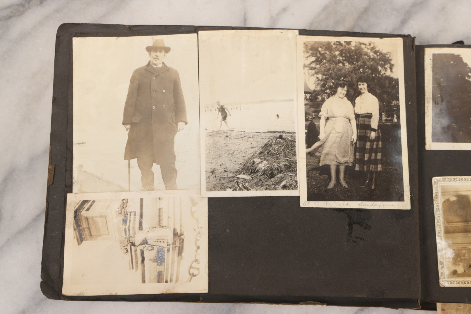 Lot 069 - Antique Snapshot Photograph Album With 100+ Images Circa 1920-1930 Including Beach Scenes In Period Swimwear, Cats And Kittens, Young Boy With American Flag, And Mechanic Working On Early Automobile