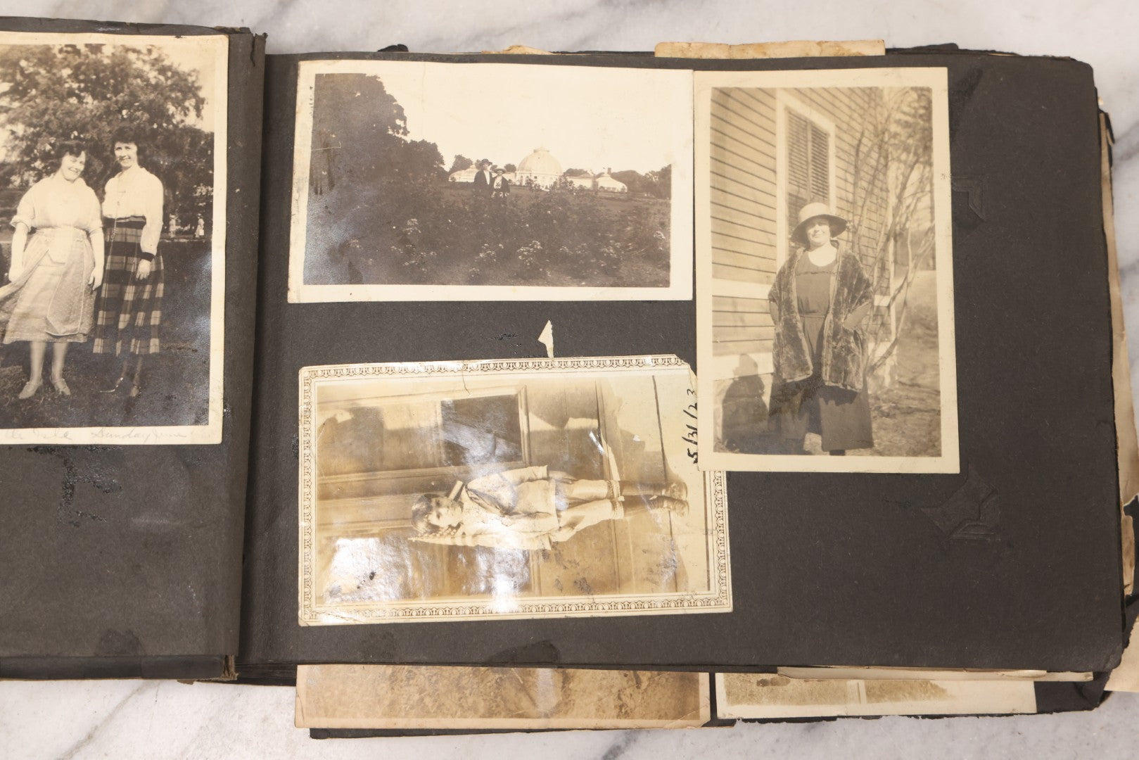 Lot 069 - Antique Snapshot Photograph Album With 100+ Images Circa 1920-1930 Including Beach Scenes In Period Swimwear, Cats And Kittens, Young Boy With American Flag, And Mechanic Working On Early Automobile