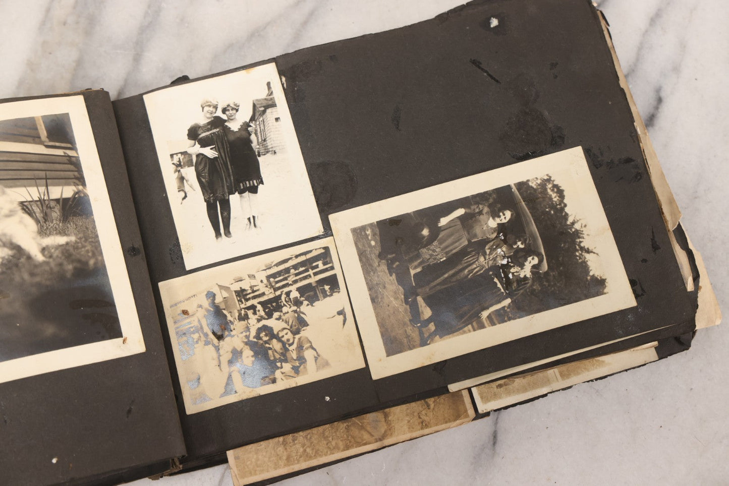 Lot 069 - Antique Snapshot Photograph Album With 100+ Images Circa 1920-1930 Including Beach Scenes In Period Swimwear, Cats And Kittens, Young Boy With American Flag, And Mechanic Working On Early Automobile