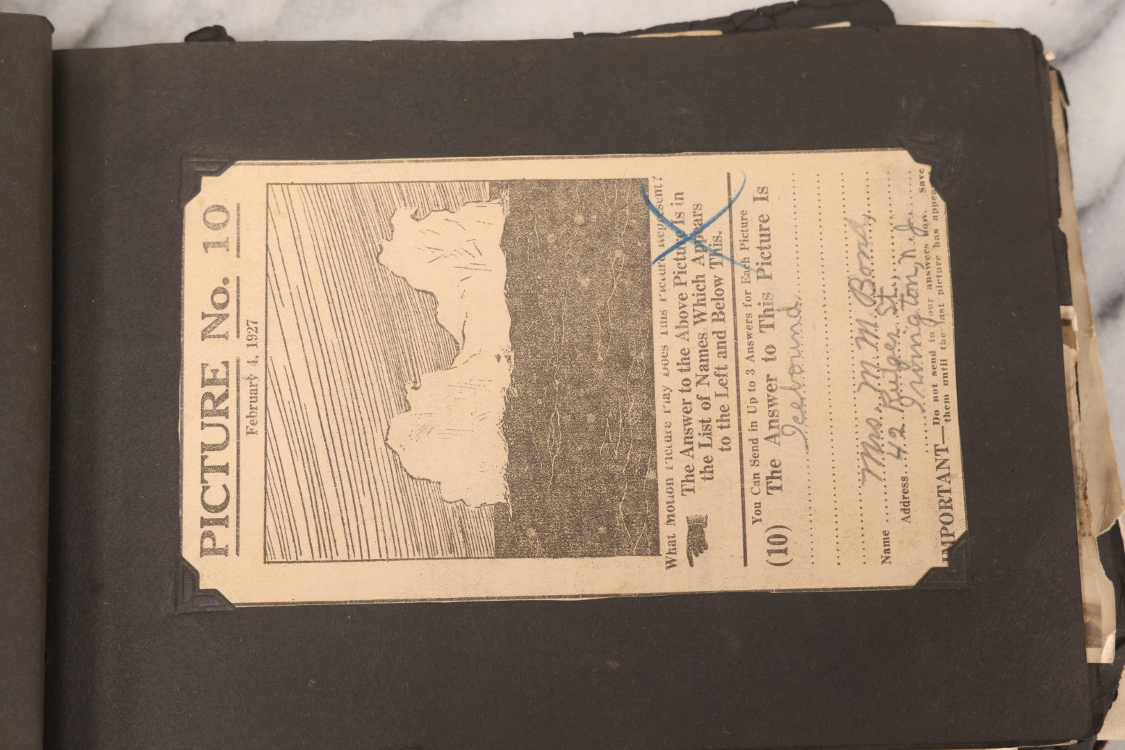 Lot 069 - Antique Snapshot Photograph Album With 100+ Images Circa 1920-1930 Including Beach Scenes In Period Swimwear, Cats And Kittens, Young Boy With American Flag, And Mechanic Working On Early Automobile