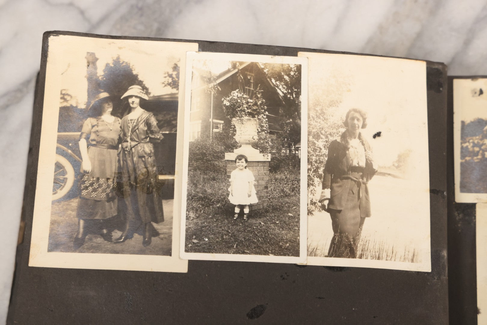 Lot 069 - Antique Snapshot Photograph Album With 100+ Images Circa 1920-1930 Including Beach Scenes In Period Swimwear, Cats And Kittens, Young Boy With American Flag, And Mechanic Working On Early Automobile