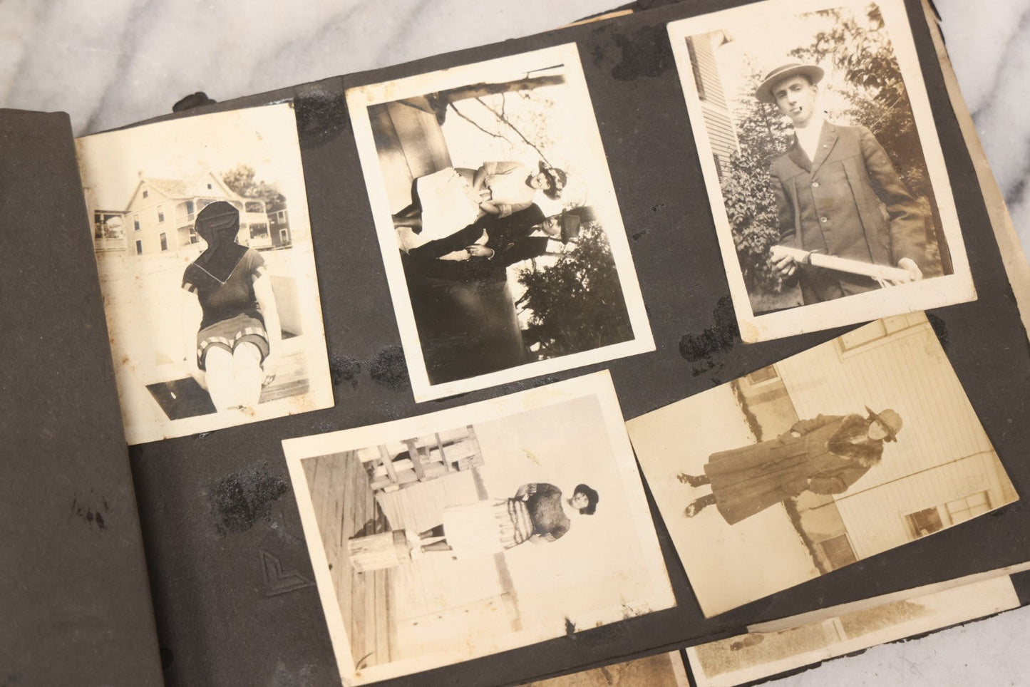 Lot 069 - Antique Snapshot Photograph Album With 100+ Images Circa 1920-1930 Including Beach Scenes In Period Swimwear, Cats And Kittens, Young Boy With American Flag, And Mechanic Working On Early Automobile