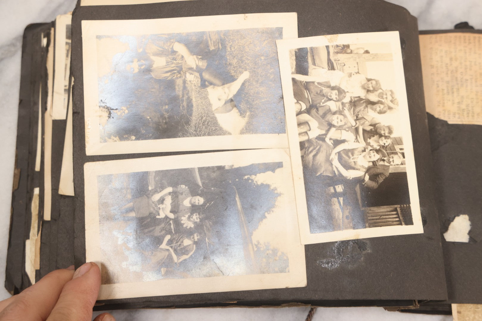 Lot 069 - Antique Snapshot Photograph Album With 100+ Images Circa 1920-1930 Including Beach Scenes In Period Swimwear, Cats And Kittens, Young Boy With American Flag, And Mechanic Working On Early Automobile
