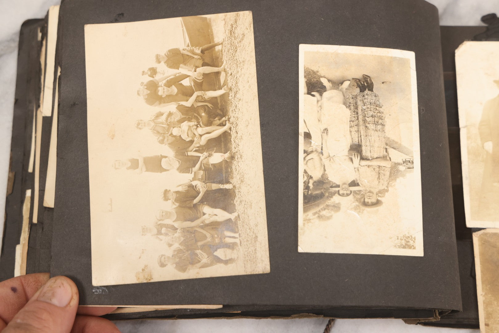 Lot 069 - Antique Snapshot Photograph Album With 100+ Images Circa 1920-1930 Including Beach Scenes In Period Swimwear, Cats And Kittens, Young Boy With American Flag, And Mechanic Working On Early Automobile