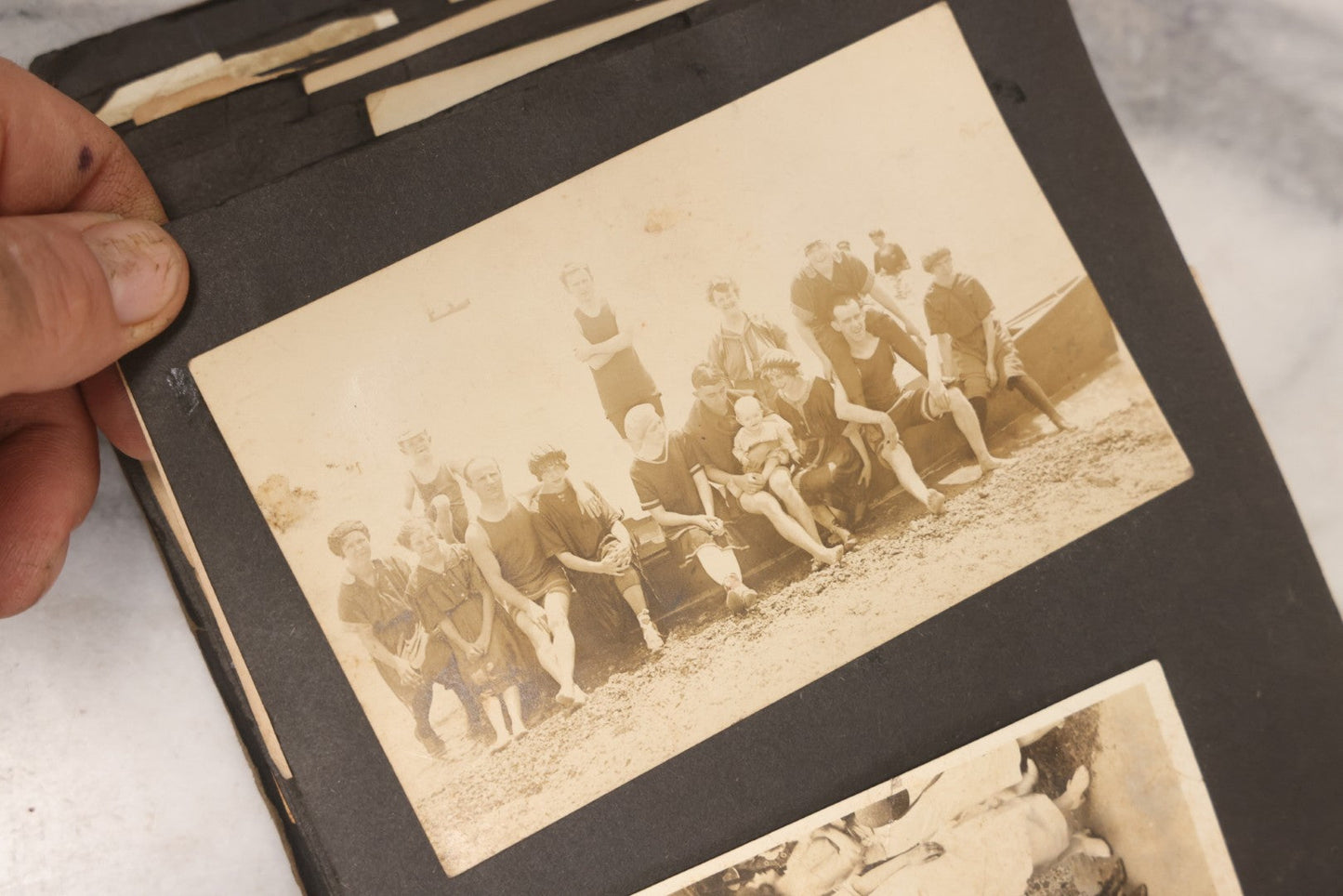 Lot 069 - Antique Snapshot Photograph Album With 100+ Images Circa 1920-1930 Including Beach Scenes In Period Swimwear, Cats And Kittens, Young Boy With American Flag, And Mechanic Working On Early Automobile