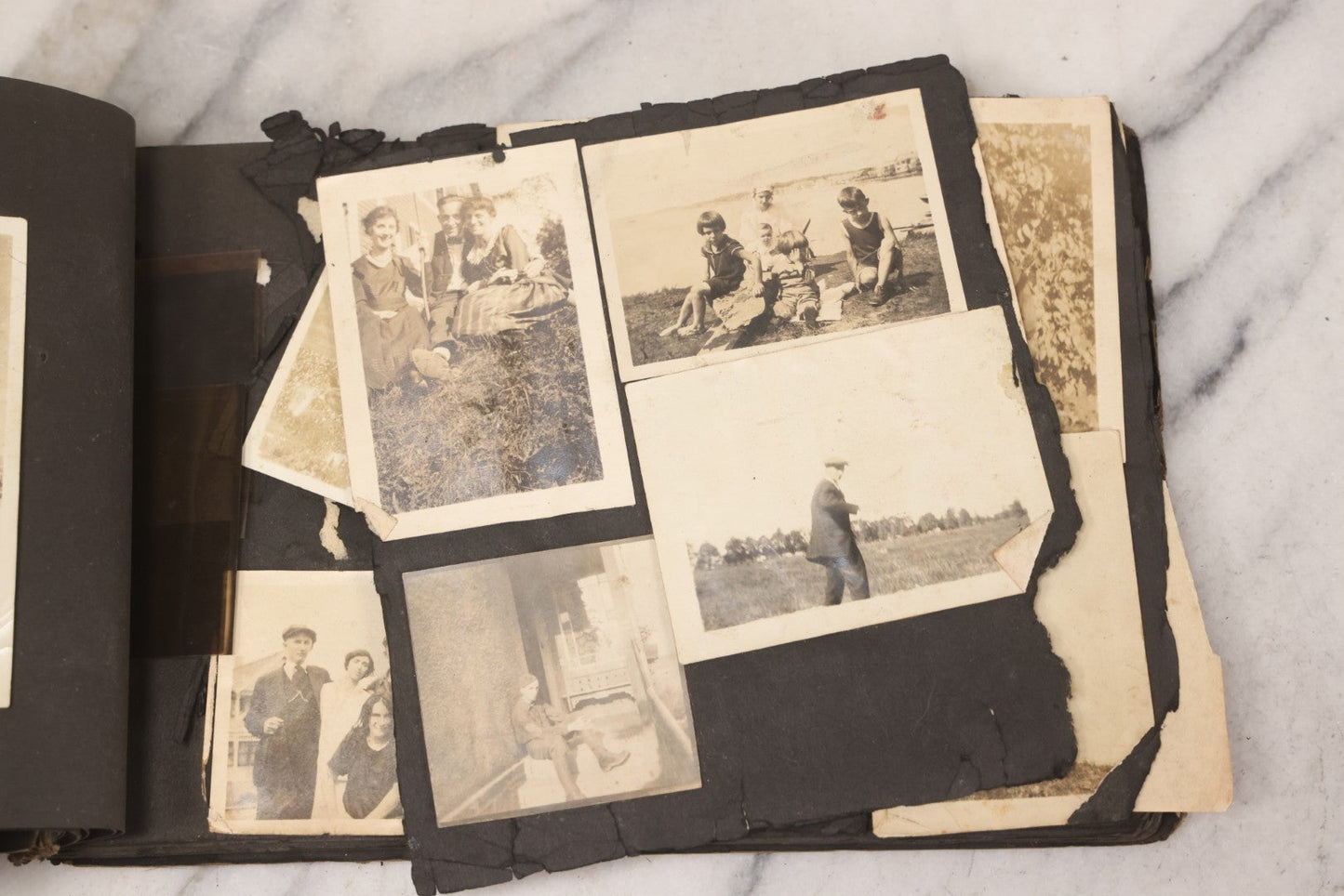 Lot 069 - Antique Snapshot Photograph Album With 100+ Images Circa 1920-1930 Including Beach Scenes In Period Swimwear, Cats And Kittens, Young Boy With American Flag, And Mechanic Working On Early Automobile