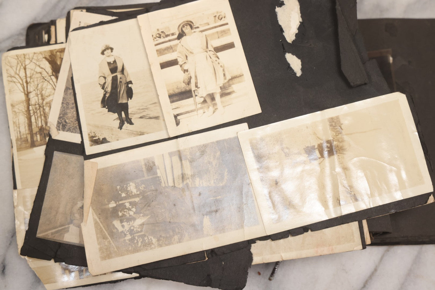 Lot 069 - Antique Snapshot Photograph Album With 100+ Images Circa 1920-1930 Including Beach Scenes In Period Swimwear, Cats And Kittens, Young Boy With American Flag, And Mechanic Working On Early Automobile