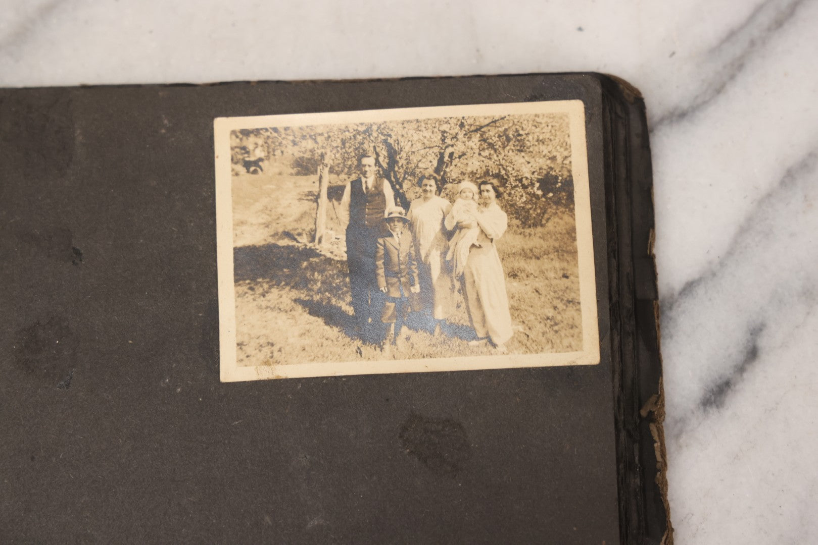 Lot 069 - Antique Snapshot Photograph Album With 100+ Images Circa 1920-1930 Including Beach Scenes In Period Swimwear, Cats And Kittens, Young Boy With American Flag, And Mechanic Working On Early Automobile