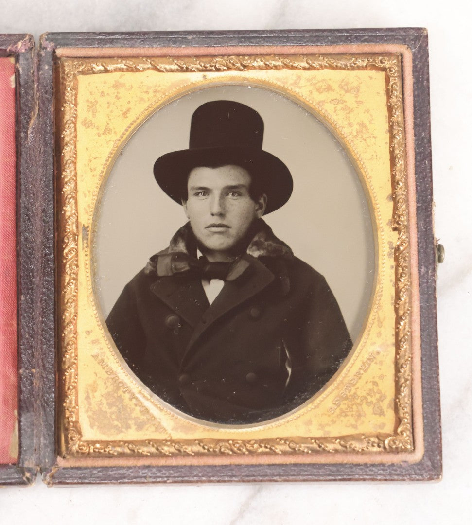 Lot 071 - Antique 1/6th Plate Ambrotype Photograph Of Young Man With Freckles Wearing Top Hat, In Full Leatherette Case, Photographed By S. F. Sterlin, Vermont