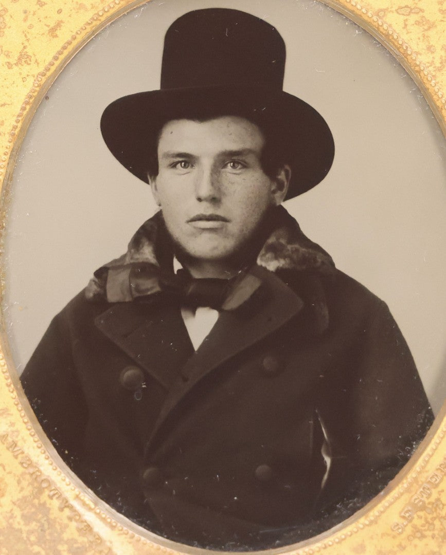 Lot 071 - Antique 1/6th Plate Ambrotype Photograph Of Young Man With Freckles Wearing Top Hat, In Full Leatherette Case, Photographed By S. F. Sterlin, Vermont