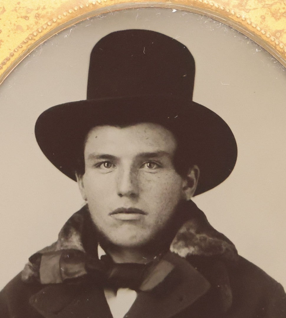 Lot 071 - Antique 1/6th Plate Ambrotype Photograph Of Young Man With Freckles Wearing Top Hat, In Full Leatherette Case, Photographed By S. F. Sterlin, Vermont