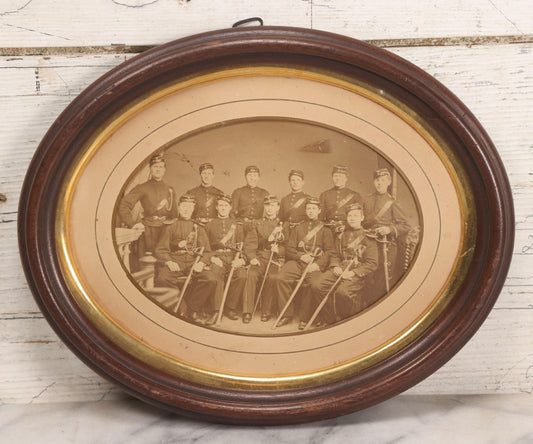 Lot 072 - Antique Civil War Albumen Photograph Of Union Cavalry Officers, Studio Group Portrait With Sabers, Circa Early 1860s In Original Oval Frame