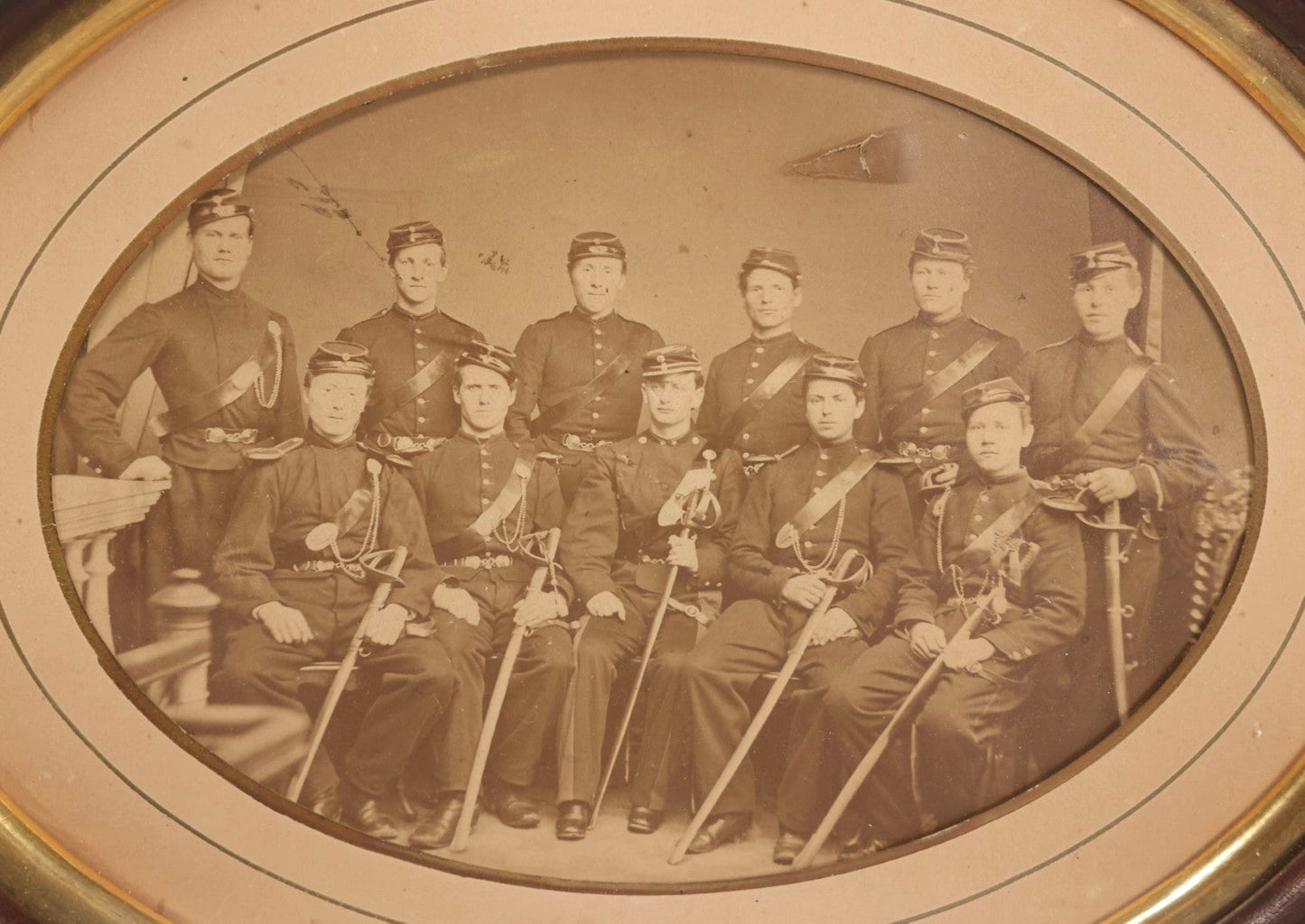 Lot 072 - Antique Civil War Albumen Photograph Of Union Cavalry Officers, Studio Group Portrait With Sabers, Circa Early 1860s In Original Oval Frame