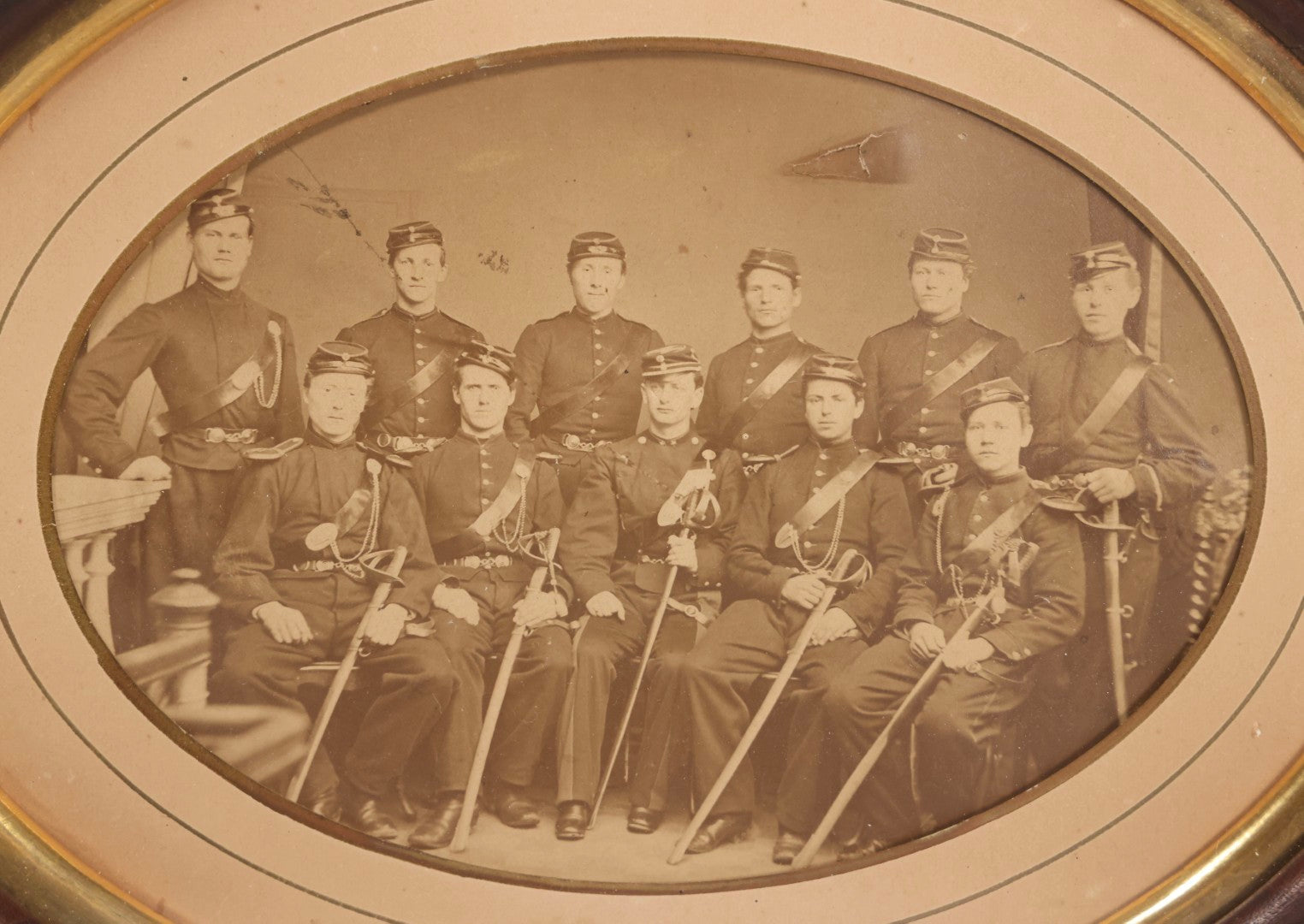 Lot 072 - Antique Civil War Albumen Photograph Of Union Cavalry Officers, Studio Group Portrait With Sabers, Circa Early 1860s In Original Oval Frame