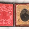 Lot 073 - Antique Civil War–Era Tintype Photograph Of Union Soldier In Uniform With Rifle, 1/6th Plate, In Original Patriotic Eagle Leatherette Case