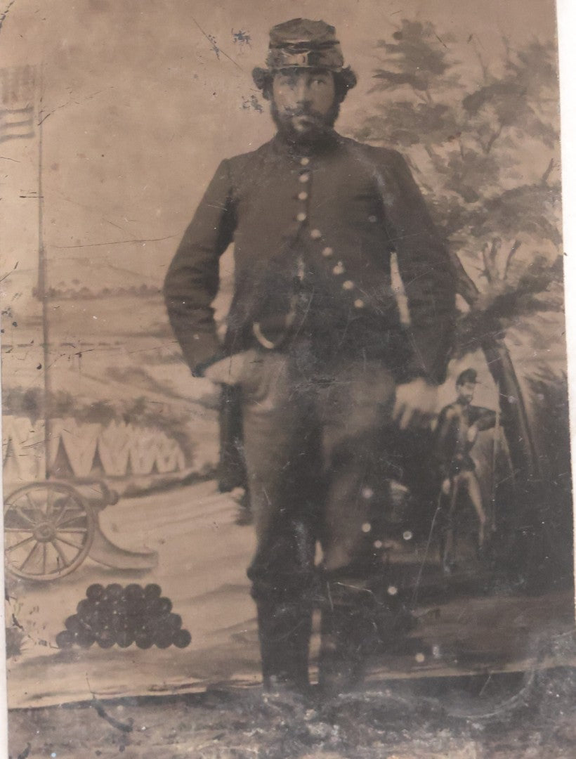 Lot 076 - Antique Civil War–Era Uncased Tintype Photograph Of Union Soldier, Full-Length Standing Portrait With Painted Military Backdrop, Circa 1860s
