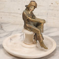 Lot 082 - Antique Alabaster Ashtray With Metal Female Pirate Figure Seated On Pedestal, Note Loss To Pedestal Base, Loosening Bolt, 8" Diameter