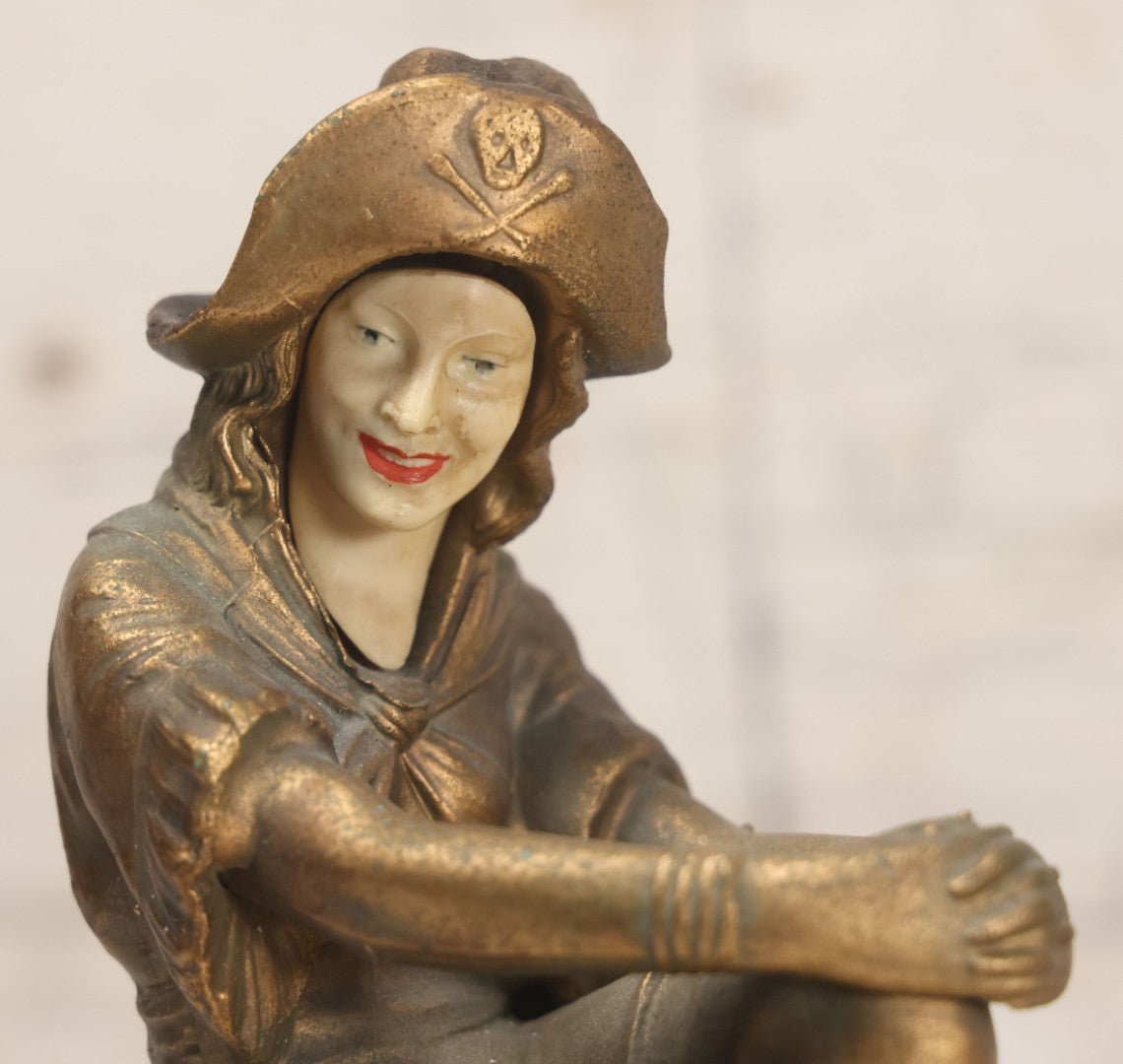 Lot 082 - Antique Alabaster Ashtray With Metal Female Pirate Figure Seated On Pedestal, Note Loss To Pedestal Base, Loosening Bolt