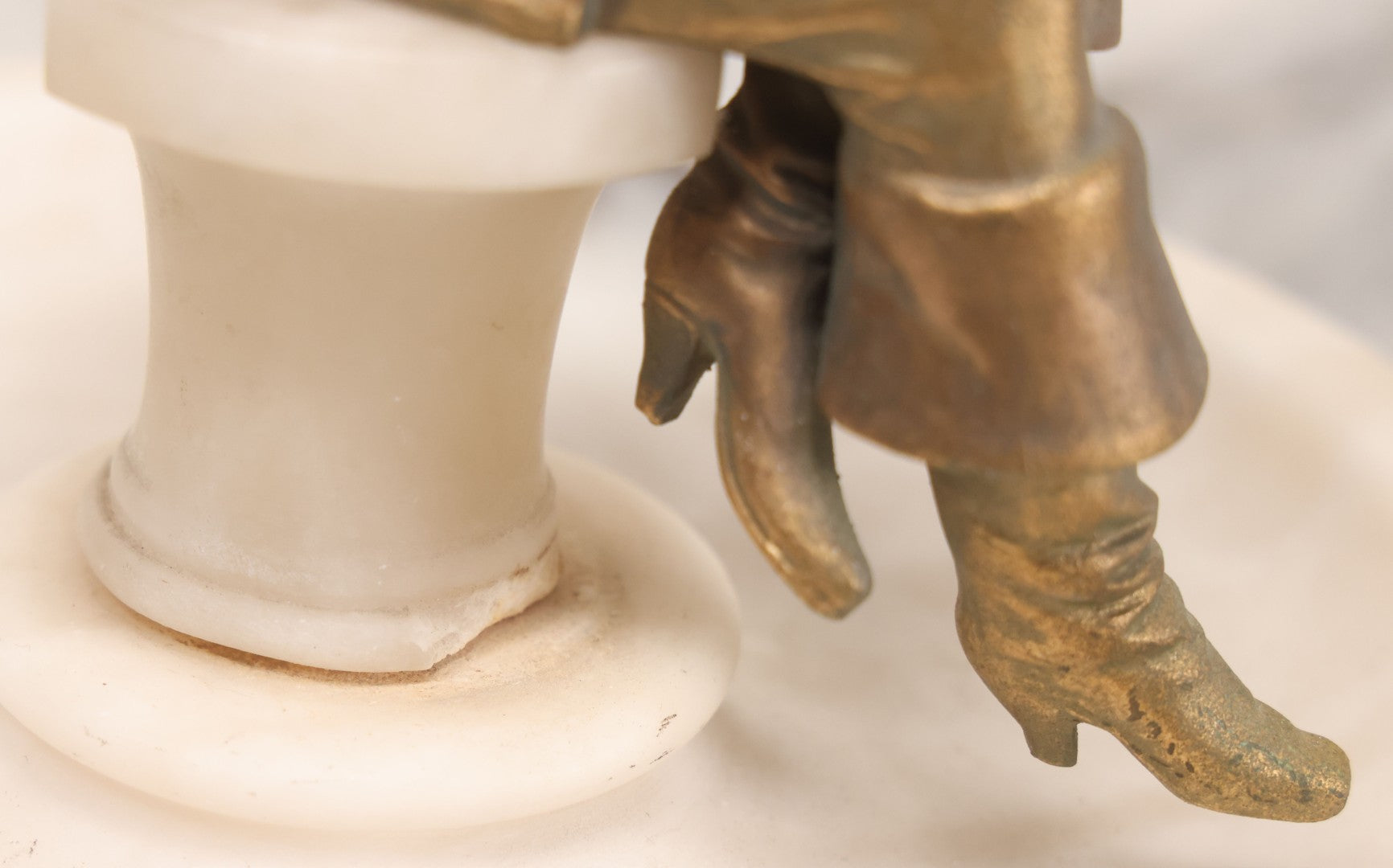Lot 082 - Antique Alabaster Ashtray With Metal Female Pirate Figure Seated On Pedestal, Note Loss To Pedestal Base, Loosening Bolt