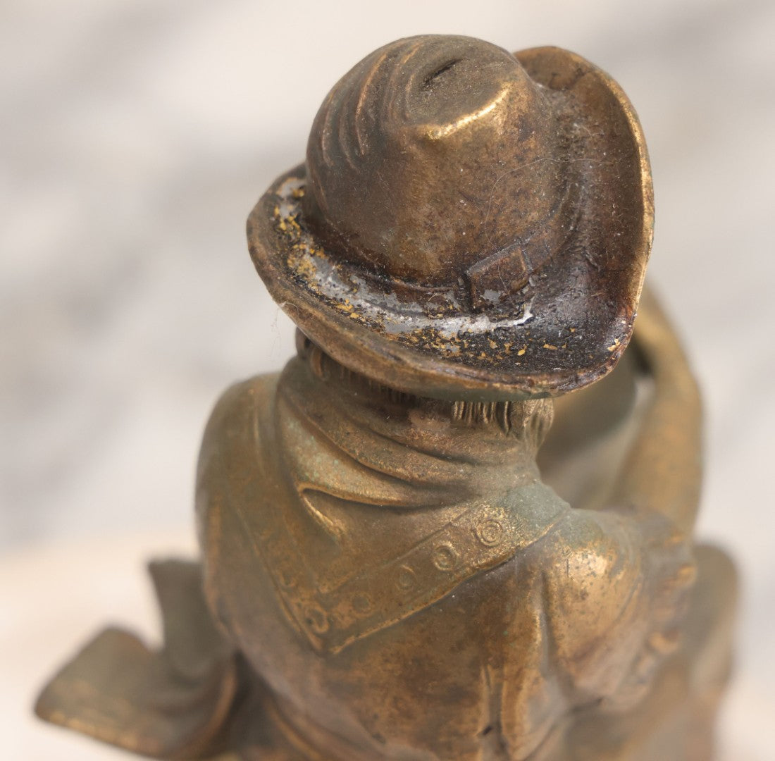 Lot 082 - Antique Alabaster Ashtray With Metal Female Pirate Figure Seated On Pedestal, Note Loss To Pedestal Base, Loosening Bolt