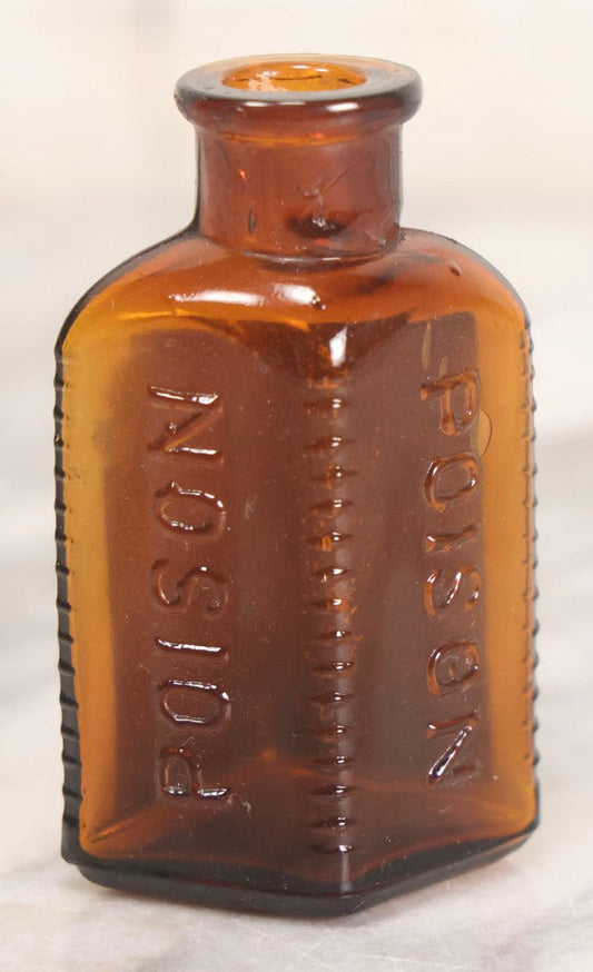 Lot 084 - Amber Poison Bottle With Poison Ribs, Tartar Emetic Paper Label, Eli Lilly & Co., Indianapolis, Indiana
