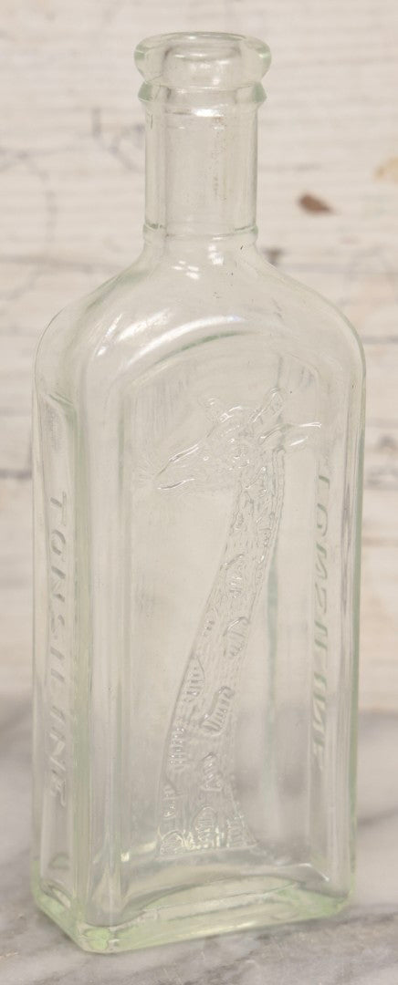 Lot 085 - Antique Tonsiline Glass Medicine Bottle With Embossed Giraffe