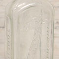 Lot 085 - Antique Tonsiline Glass Medicine Bottle With Embossed Giraffe, 6-3/4" H