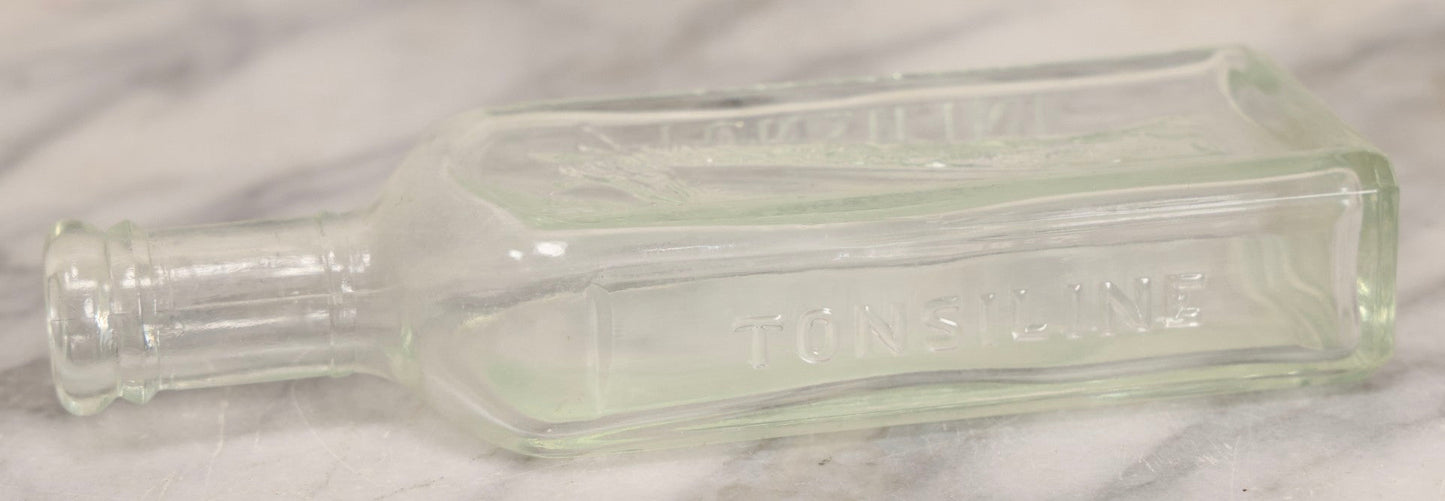 Lot 085 - Antique Tonsiline Glass Medicine Bottle With Embossed Giraffe