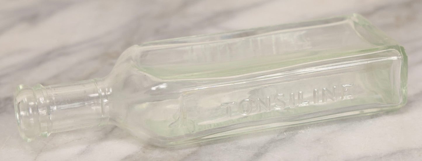 Lot 085 - Antique Tonsiline Glass Medicine Bottle With Embossed Giraffe