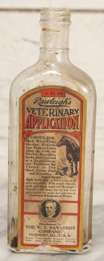 Lot 086 - Antique Rawleigh's Veterinary Application Glass Bottle With Original Paper Label, The W.T. Rawleigh Company, Freeport, Illinois