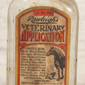 Lot 086 - Antique Rawleigh's Veterinary Application Glass Bottle With Original Paper Label, The W.T. Rawleigh Company, Freeport, Illinois, 8-3/8" H