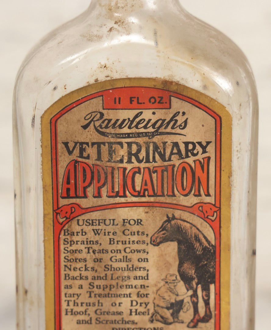 Lot 086 - Antique Rawleigh's Veterinary Application Glass Bottle With Original Paper Label, The W.T. Rawleigh Company, Freeport, Illinois