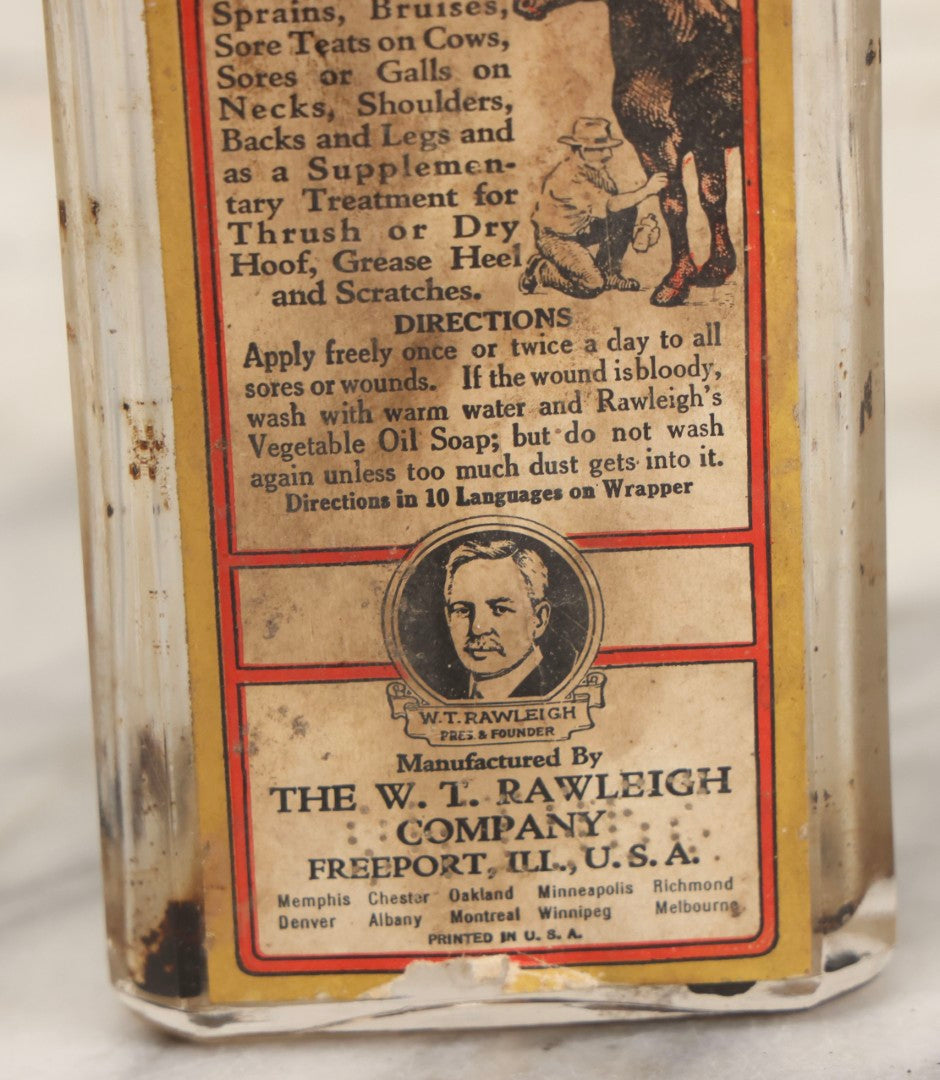 Lot 086 - Antique Rawleigh's Veterinary Application Glass Bottle With Original Paper Label, The W.T. Rawleigh Company, Freeport, Illinois